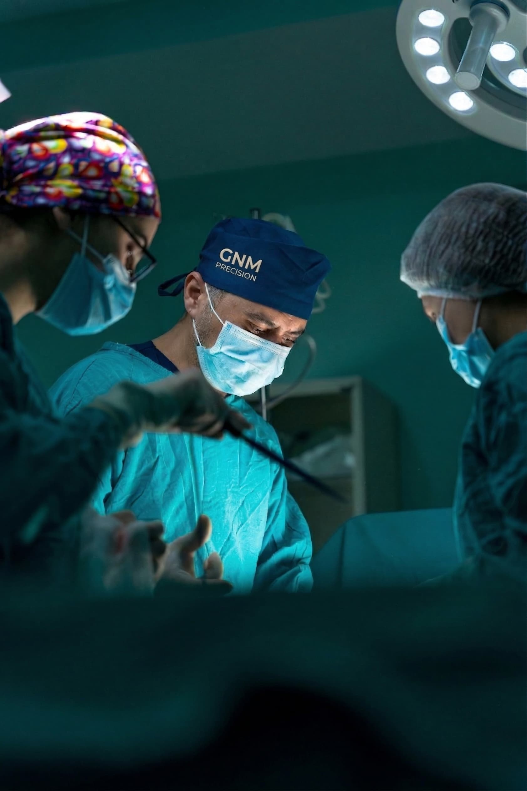 Surgical team performing laparoscopic surgery with GNM Precision instruments